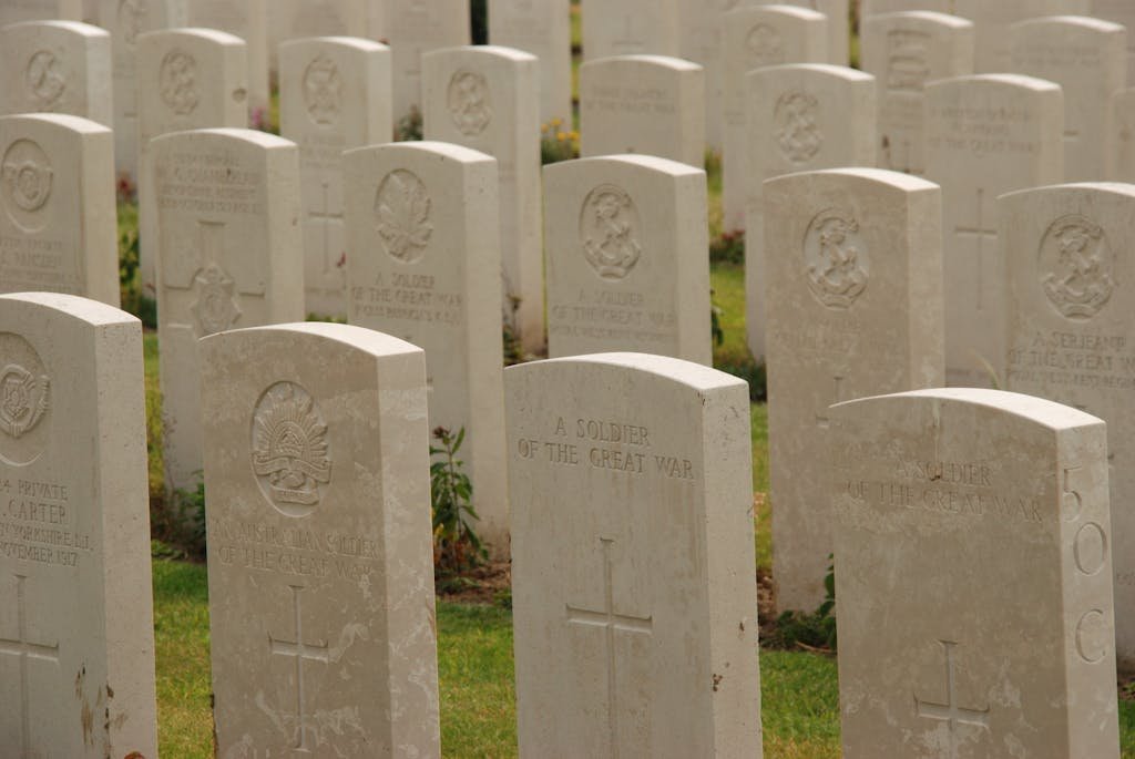 Peaceful view of World War I gravestones in a military cemetery, symbolizing remembrance. Can you visit any cemetery.